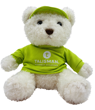 Медведь белый в зеленой футболке
